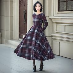 Plaid is a vintage classic choice, and it's perfect for autumn and winter to wear this warm plaid skirt of ours, and the waisted, flared shape is also very slimming. DETAIL * 30% wool, 30% fiber, 40% polyester * fully satiny lining, more nice to the touch body * Round neckline * Long sleeves dress * Two side seam pockets * Back zipper closure * Fit and flare dress * Midi wool dress * Plaid wool dress, Retro wool dress MODEL SIZE Bust 85 cm(33.4")  Waist 67 cm(26.7")  Height 168cm (5' 6") She wea Retro A-line Vintage Dress For Fall, Fitted A-line Plaid Dress For Fall, Vintage A-line Midi Dress For Fall, Elegant Plaid Midi Dress, Classic A-line Winter Dress, Fitted A-line Vintage Dress For Winter, Retro A-line Midi Dress For Fall, Midi-length Plaid Dress For Fall, Vintage Plaid Dress For Fall