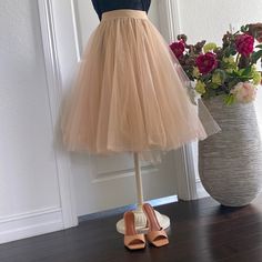 This Midi Beige Tulle Skirt Is Extra Puffy For Special Occasions. It’s Triple Layered And Has An Elastic Waistband For More Comfort. Last One Available! Size Small (Fits Sizes 2-8us) Beige Party Skirt For Spring, Spring Party Beige Skirt, Beige Tiered Skirt For Party, Cream Flared Skirt For Party, Beige Flared Skirt For Wedding, Summer Party Cream Skirt, Summer Wedding Beige Skirt, Spring Wedding Beige Skirt, Beige Flowy Skirt For Party