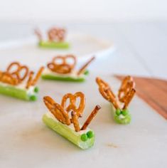 some pretzels are sitting on a white plate