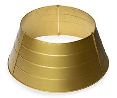 a gold colored lamp shade on a white background with clippings to the bottom