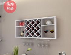 there is a wine rack on the wall