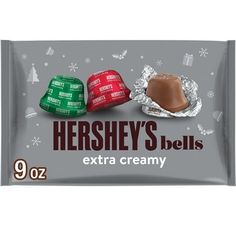 Treat your loved ones this Christmas with HERSHEY'S bells extra creamy solid milk chocolate candy. Perfect for lunch boxes, snack breaks, holiday movie nights and sharing moments throughout the season, these candies are crafted with delectably smooth milk chocolate for an exceptionally creamy, delicious flavor in every bite. Each bell candy comes individually wrapped in red, silver or green holiday foil too, providing a festive and eye-catching focal point in holiday candy dishes at any celebrat Holiday Movie Night, Candy Toppers, Christmas Candy Bag, Best Holiday Cookies, Milk Chocolate Candy, Chocolate Snacks, Food Allergens, Hershey Chocolate, Holiday Candy