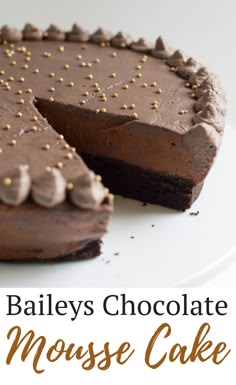 a chocolate mousse cake on a plate with the words baileys chocolate mousse cake