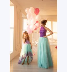 Matching Ariel Dresses, Mommy and Me Dress, Little Mermaid Party Outfits Mommy and Me outfits great suitable for Little Mermaid Birthday Party Theme. Mommys dress is knee length tutu dress with corset type top part that is adjustable. Girl dress is hi lo dress, it has open back, removable bow on backside and lace trim. Lovely dresses in turquoise and lavender color made of satin and soft tulle. Fabric: satin, tulle. cotton linen, tafetta Sleeves: sleeveless Length: hi low length with short train Mermaid Birthday Outfit Mom, Mermaid Theme Dress, Mermaid Birthday Party Theme, Blue Baby Dress, Mommy And Me Dress, Little Mermaid Birthday Party, Mermaid Birthday Outfit, Little Mermaid Party, Daughter Fashion