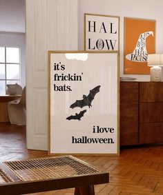 there is a sign that says it's trickin bats i love halloween