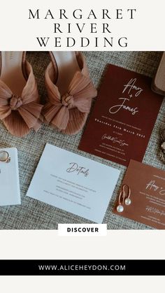 the wedding stationery is laid out with shoes and rings