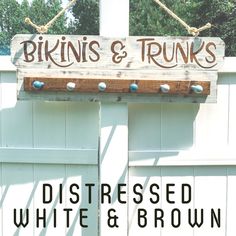 a sign that says, distressed white and brown