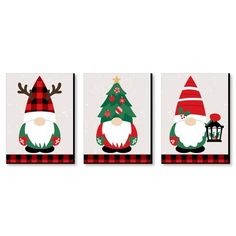 three christmas decorations with santa clause and trees