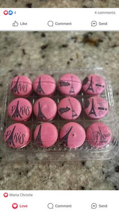 pink and black paris buttons in a plastic container on a counter top with the caption i love you like comments