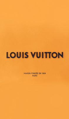 the louis vuitton logo is shown on an orange wall in paris, france