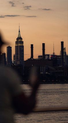 a person is looking at the city skyline