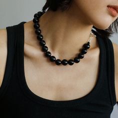 Product Details: Craftsmanship: silver plated Material: black agate 14mm Size: Necklace inner circumference 42cm Weight: 105g Black Onyx Necklace, Onyx Necklace, Chanel Earrings, Onyx Bead, Black Agate, Black Necklace, Neutral Fashion, Recycled Sterling Silver, Agate Beads