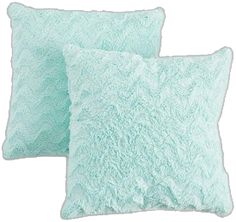 two light blue pillows on a white background