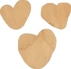 three pieces of wood with hearts cut out of them to make a heart shaped piece