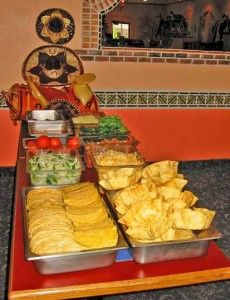 an assortment of food sitting on top of a table