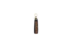 an animal print keychain hanging from a chain