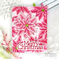 a christmas card with pink snowflakes on it