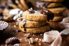 a stack of cookies sitting on top of a wooden table