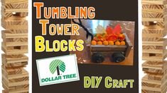 there is a wooden block tower with flowers in it and the words, tumbling tower blocks diy craft