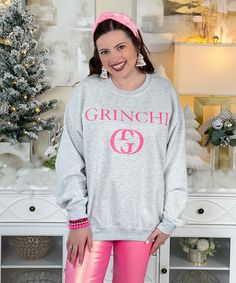 Introducing our "Grinchi Sweatshirt," a fun and stylish addition to your Christmas wardrobe. This sweatshirt features the playful and distressed "Grinchi" word with a unique logo in hot pink. You have the option to choose your preferred sweatshirt color from a variety of choices, including ash, light pink, Irish green, sand, and white. The "Grinchi Sweatshirt" is available in a wide range of sizes, from XS to 5XL.
This sweatshirt offers a unique twist on the classic Grinch character, allowing you to express your holiday spirit with a touch of humor. Whether you're attending Christmas parties, exchanging gifts, or simply want to showcase your style during the festive season, this sweatshirt is the ideal choice. Its eye-catching design adds a playful and distinctive element to your Christmas Grinch Characters, G Words, Soft Air, Unique Logo, In Hot, Wonderful Time, Grinch, Christmas Outfit, Festival Season