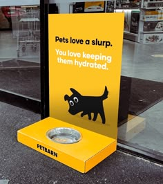 a sign that says pets love at slurp you love keeping them hydrated