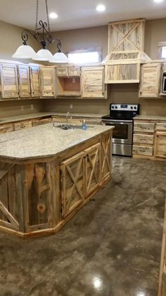 a large kitchen with wooden cabinets and an island in the middle of the flooring