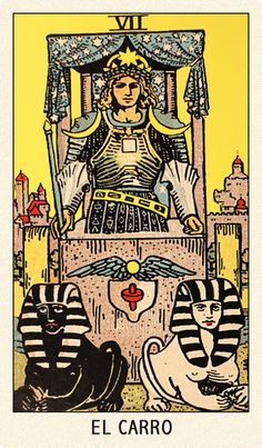 the chariot tarot card with two cats sitting in front of it and one cat standing on