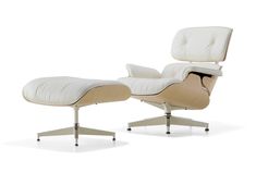 the eames lounge chair and ottoman is shown in white leather