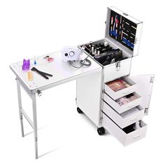 Portable Lockable Rolling Makeup Station Mobile nail desk built-in or portable Speakers(Bluetooth or USB), Mirror and Drawers, made of fire-retardant material and strong aluminum structure, keep all your cosmetics and salon equipped. safe and organized. Serve your customers. Features: Expandable floor-standing table with foldable design for use as a trolley case or manicure workstation Equipped with 360° swivel removable wheels that can be easily moved anywhere and changed easily Comes with musi Nail Supply Storage Portable, Daily Use Portable Rectangular Cosmetic Storage, 10 Drawer Rolling Cart Makeup Organizer, Makeup Case With Wheels, Rolling Makeup Case, Nail Desk, Nail Station, Mobile Nails, Really Useful Boxes® 8 Drawer Rolling Cart