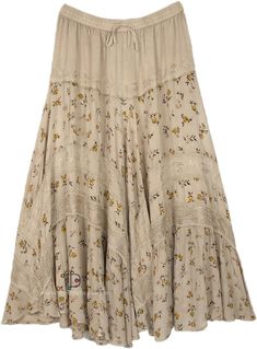 Transport yourself to a magical realm in this ethereal faun maxi skirt featuring wispy panels of floral lace and print. Made from flowing rayon with a comfortable elastic waist and adjustable drawstring, the skirt sways with your every move. #tlb #XLPlus #Solid #ExtraLargeSkirt Flowy Lace Maxi Skirt With Flared Design, Bohemian Lace Maxi Skirt For Summer, Beige Bottoms With Lace Trim Flowy Design, Tiered Maxi Skirt With Lace Patchwork For Summer, Bohemian Flowy Full-length Maxi Skirt, Summer Tiered Maxi Skirt With Lace Patchwork, Bohemian Tiered Skirt Bottoms With Lace Patchwork, Flowy Maxi Skirt With Lace Trim, Beige Floral Print Tiered Maxi Skirt