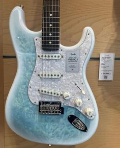 an electric guitar is on display at the museum