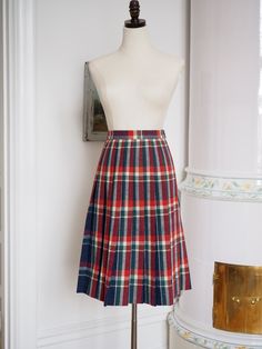 Elegant plaid and pleated 1950s skirt.  Finest wool fabric. Metal zipper at side.  Measurements:  Waist 62 cm/ 24.4"  Length 63 cm/ 24.8"  Excellent condition. Vintage Full Pleated Skirt For Fall, Vintage Full Skirt With Accordion Pleats, Vintage Accordion Pleats Skirt For Fall, Fitted Vintage Plaid Skirt, Vintage Plaid Full Skirt, Vintage Plaid Pleated Skirt For Fall, Vintage Wool Lined Skirt, Vintage Pleated Plaid Skirt, 1950s Skirt