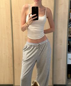 Loungewear aesthetic outfit inspo, sweatpants outfit, casual style inspo, boujee outfit, tank top Baggy Sweatpants Crop Top Outfit, Sports Bra Sweatpants Outfit, Tank Top Sweatpants Outfit, Sweatpants With Tank Top, Sweats And Tank Top Outfit, Aesthetic Outfits Sweatpants, Thong And Sweatpants Outfit