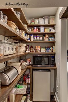 the pantry is stocked with lots of food