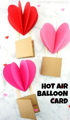 valentine's day card made with hot air balloons and paper hearts on clothes pins