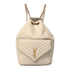 This is an authentic SAINT LAURENT Lambskin Matelasse Monogram Joe Backpack in Cream. This backpack is crafted of fine off white lambskin leather. The backpack features adjustable leather shoulder straps, aged gold hardware and a crossover flap with a gold YSL logo. The top opensto a spacious black fabric interior with zipper pocket. Luxury Beige Leather Backpack For Everyday, Luxury Beige Leather Backpack, Luxury Soft Leather Backpack, White Luxury Leather Backpack For Daily Use, Luxury White Leather Backpack For Daily Use, Luxury Leather Backpack In Cream, Luxury Cream Leather Backpack, Luxury Beige Backpack, Luxury Beige Leather Backpack For Daily Use