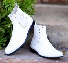 White Chelsea Boots for Men Slip on Leather Boots
White Chelsea Boots for Men crafted with premium quality genuine leather. We use high-quality materials, including premium full-grain genuine leather, which ensures durability, comfort, and an elegant appearance. We are specialized in highly customized handmade leather boots for men. Our boots are crafted by skilled artisans who meticulously create each pair by hand, paying attention to detail and using traditional craftsmanship techniques.
These boots are often considered a mark of quality and luxury, as the process involves a higher level of skill and care compared to mass-produced boots. Handmade leather boots offer unparalleled craftsmanship, ensuring exceptional quality and durability. Ultimately, choosing handmade leather boots ensure White Chelsea Boots, Chelsea Boots For Men, Handmade Leather Boots, Western Boots For Men, Mens Dress Boots, Brogue Boots, Mens Ankle Boots, Leather Western Boots, Harness Boots