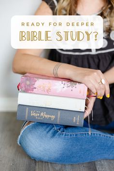 a woman is sitting on the floor with books in her lap and text reading ready for deeper bible study?