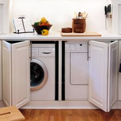 a washer and dryer in a small kitchen