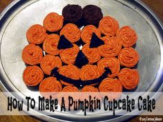 cupcakes in the shape of a pumpkin face on a metal plate with text overlay how to make a pumpkin cupcake cake