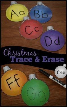 christmas ornament trace and erase game with free printables on the table