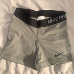 Nike Training Shorts Gray Fitted Athletic Shorts, Fitted Gray Athletic Shorts, Nike Gray Athletic Shorts, Nike Gray Athleisure Shorts, Nike Gray Workout Shorts, Nike Gray Stretch Shorts, Nike Gray Bottoms With Built-in Shorts, Nike Bottoms With Built-in Shorts In Gray, Nike Women Outfits