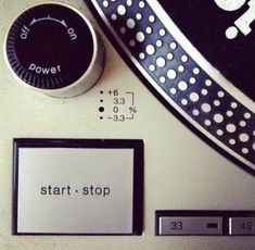 a close up of a clock and some buttons