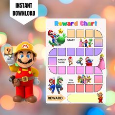 the mario bros reward chart is displayed next to a toy