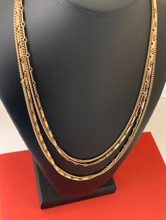 This classic shiny two layer gold rectangular bar link and chain vintage decorative necklace is 50 inches long. The long length makes the necklace versatile so you can wear it layered.  It is in wonderful like new vintage condition.  This is a beautiful classic timeless necklace. I specialize in finding fun wearable jewelry.  Please browse my shop for more options.  I box jewelry sales ready to be given as gifts. I often combine multiple item purchases to save on shipping. Please message me if you wish to combine 3 or more items. I Box, Wearable Jewelry, Timeless Necklace, Beading Crafts, Box Jewelry, Photo Bracelet, Gold Tone Metal, Long Length, New Vintage