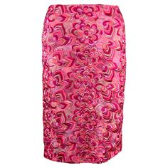 Presenting a hot pink skirt Versace skirt, designed by Donatella Versace. From Donatella's landmark Spring/Summer 2000 collection, this skirt is completely covered in intricate floral embroidery. A rare find, this Y2K beauty is masterfully tapered to hug the body. Approximate measurements: Size - 38IT/4US Waistband to hem: 23" Waist: 26" Hips: 35" 65% viscose, 25% cotton, 10% polyester Formal Pink Pencil Skirt, Formal Pink Lined Skirt, Festive Fitted Pink Skirt, Pink Embroidered Skirt For Parties, Embroidered Pink Skirt For Party, Formal Pink Silk Skirt, Pink Embroidered Skirt, Fitted Pink Embroidered Skirt, Pink Versace Dress