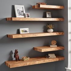 10 FAQs About Floating Shelves Q: "What makes floating wooden shelves a great addition to home decor?" A: Floating wooden shelves provide a versatile and stylish solution for home decor by offering functional storage without sacrificing aesthetics. They can showcase decor items, books, and collectibles, enhancing the overall look of any room.  Q: "How can white floating shelves contribute to a clean and stylish interior?" A: White floating shelves contribute to a clean and stylish interior by adding a sense of lightness and simplicity. They create a neutral backdrop for displaying colorful items, making the space visually appealing.  Q: "In what ways can floating bookshelves be utilized for both storage and display purposes?" A: Floating bookshelves are excellent for storage and display. T Floating Shelves Different Lengths, Floating Shelves For Corner Wall, Thick Wood Shelves Living Room, Offset Wall Shelves, Floating Wood Shelves Office, Long Floating Shelves Living Room Modern, Floating Shelves Angled Wall, Wall Book Display Ideas, Wooden Shelves On Wall