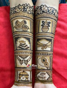 the legs are decorated with henna designs