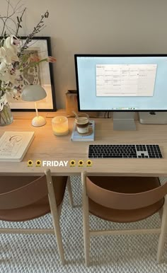 a desk with a keyboard and monitor on it