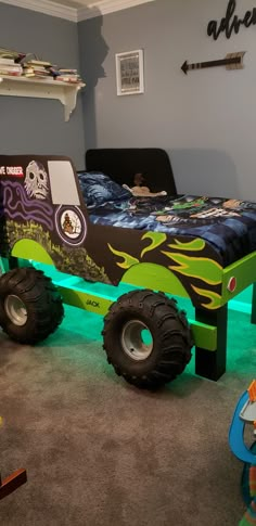 a bed made to look like a monster truck